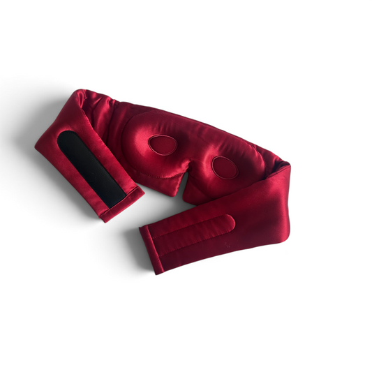 Gora Silk Sleep Mask in Merlot seen from behind — moulded eye cups, black inner lining and the adjustable silk-covered strap