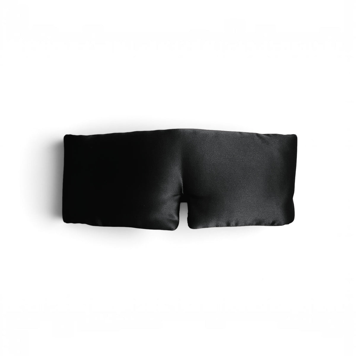 Gora Silk Sleep Mask in Umbra — a black 3D contoured mulberry silk sleep mask on a white background